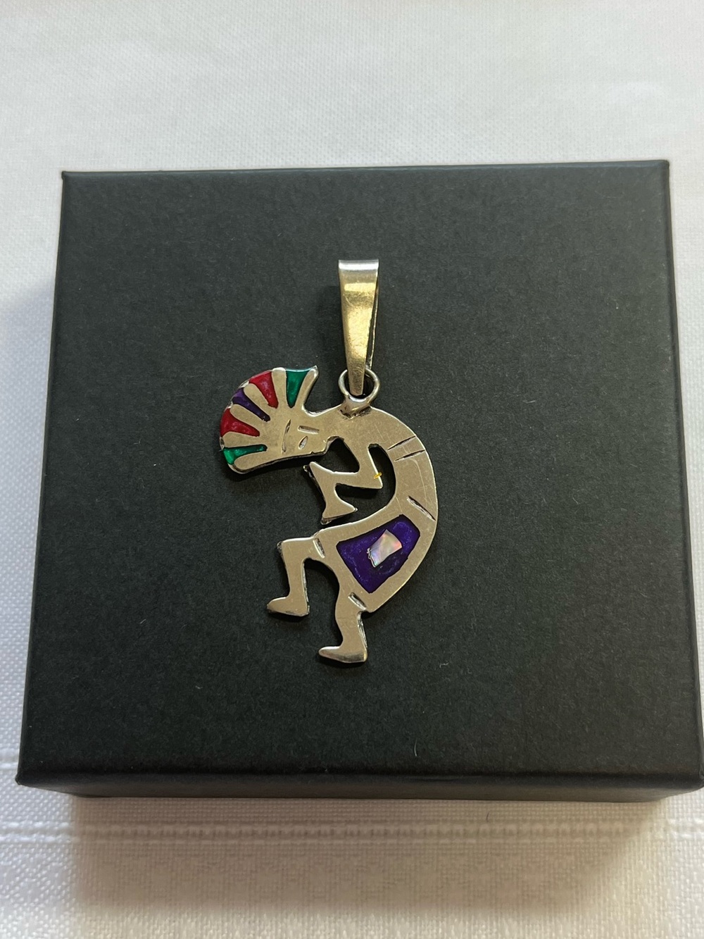 Sterling silver Kokopelli pendant with colourful accents